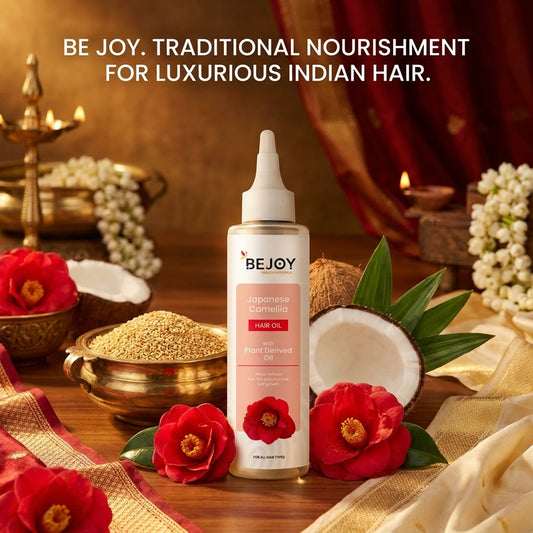 BEJOY hair oil bottle with traditional elements and text on a wooden table.
